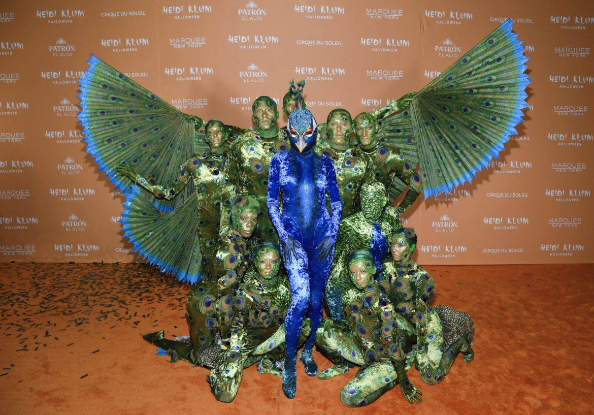 HEIDI KLUM WOWS IN SPECTACULAR PEACOCK COSTUME AT HER ICONIC HALLOWEEN PARTY